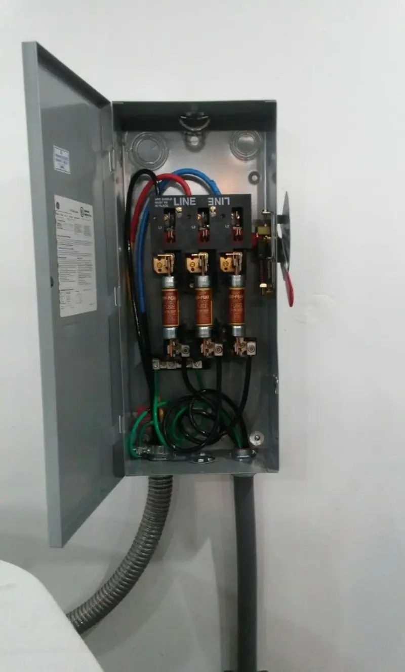 Three-phase disconnect switch installed for Smoke Detector Installation in Hays